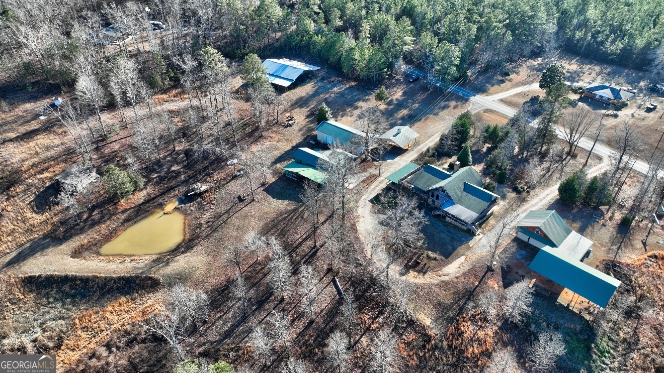 362 Brook Road Barnesville, GA 30204 - Photo 67 of 70 a view of a house with a yard and a large tree
