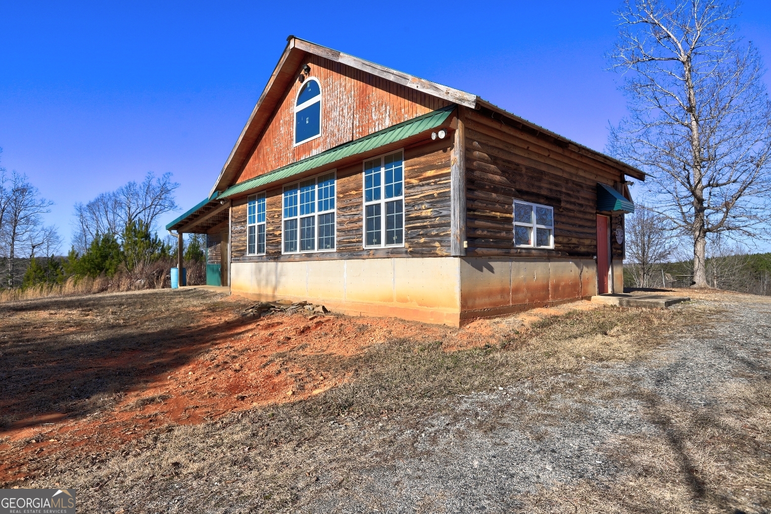 362 Brook Road Barnesville, GA 30204 - Photo 8 of 70 a front view of a house with a yard