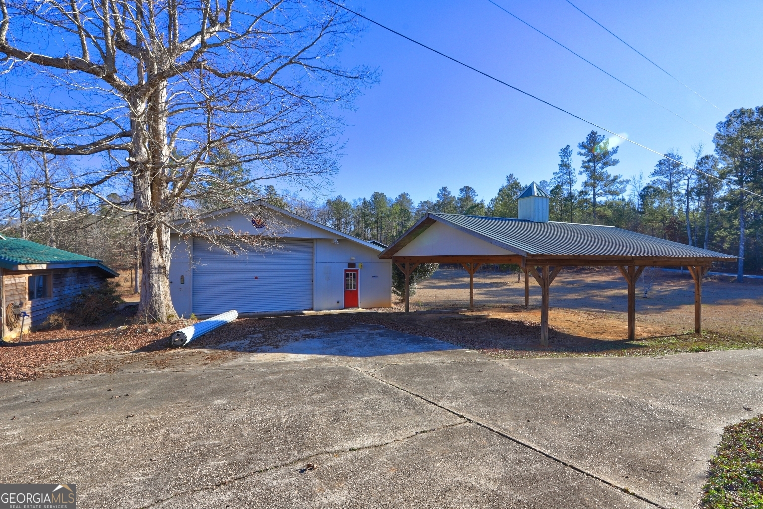 362 Brook Road Barnesville, GA 30204 - Photo 9 of 70 a view of a house with a yard and tree