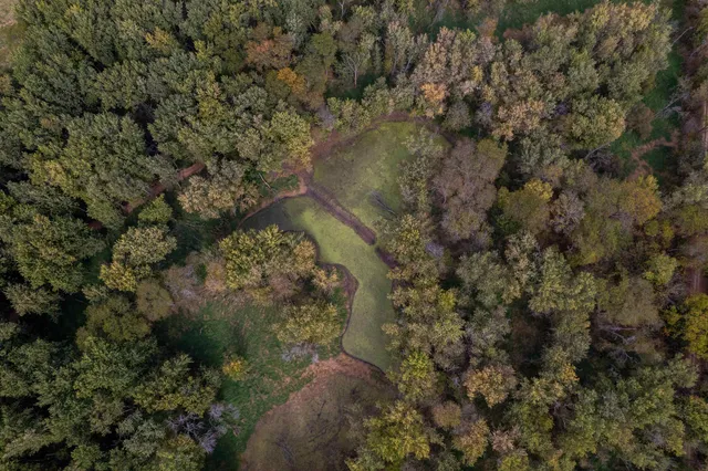 a view of a lake with a mountain in the background