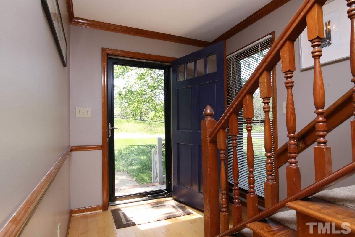 1720 Park Ridge Way Raleigh, NC 27614 - Photo 3 of 25 a view of balcony and wooden floor
