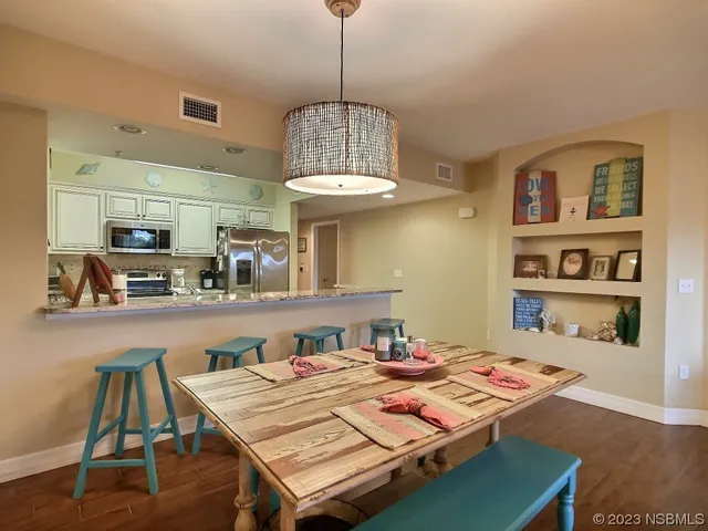a view of a dining room with furniture