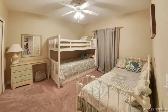 a bedroom with a bed and a cabinets