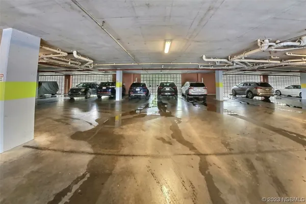 a view of a studio with wooden floor