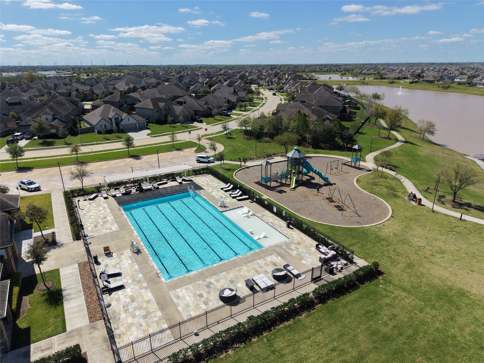 13808 Stark Bridge Lane Rosharon, TX 77583 - Photo 34 of 39 family pool, long with a playground and walking trails