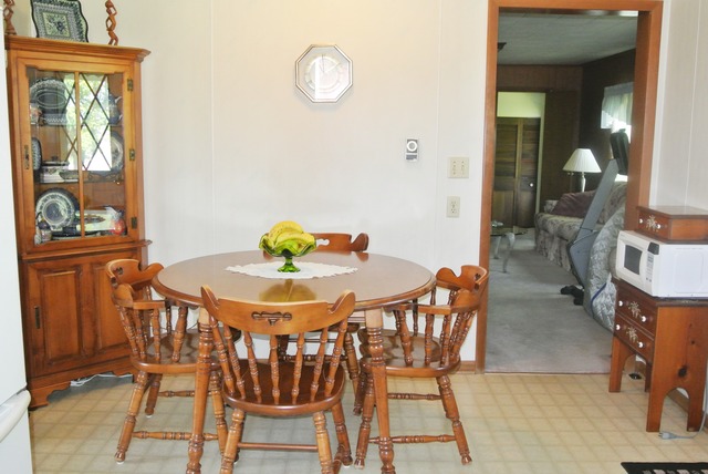 6388 Leland Road Waterman, IL 60556 - Photo 12 of 23 a dining room with furniture and window