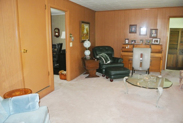 6388 Leland Road Waterman, IL 60556 - Photo 13 of 23 a living room with furniture and a table