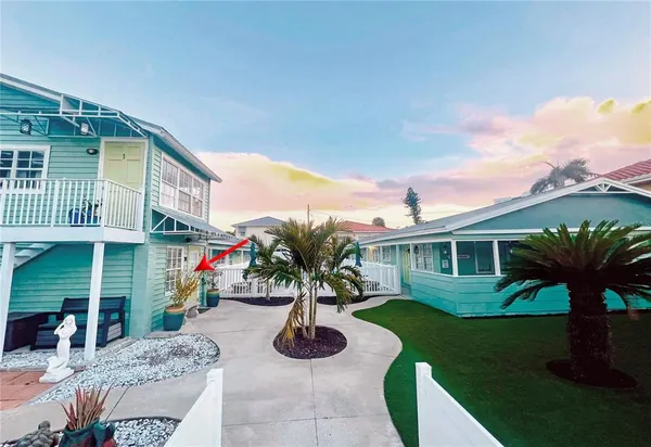 a house view with a garden space