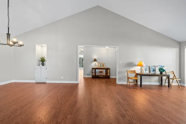 a view of a livingroom with furniture and wooden floor