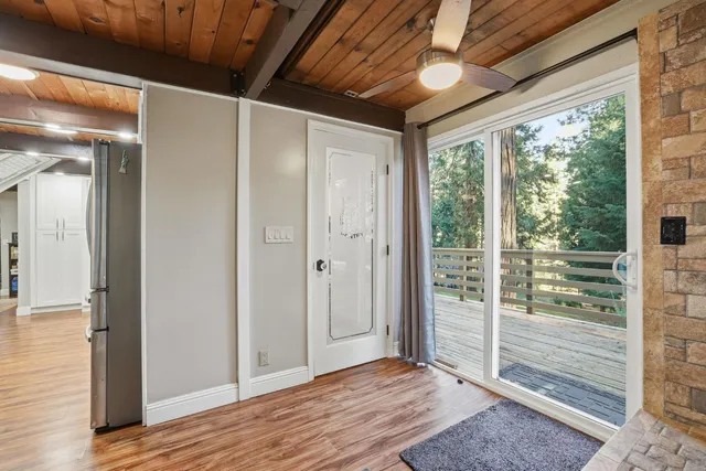 a kitchen with appliances cabinets and a counter space