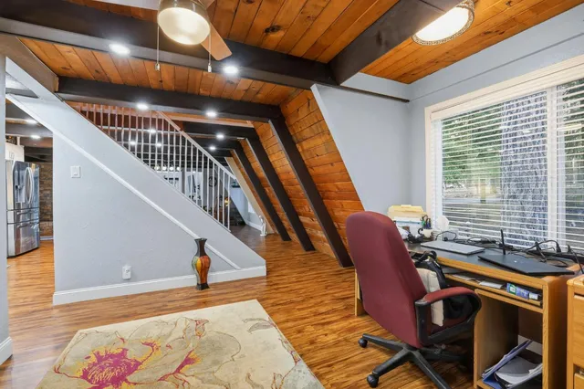 a en suite bathroom with a double vanity sink and a mirror