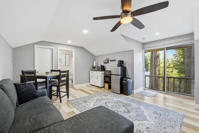 a view of a backyard with sitting area