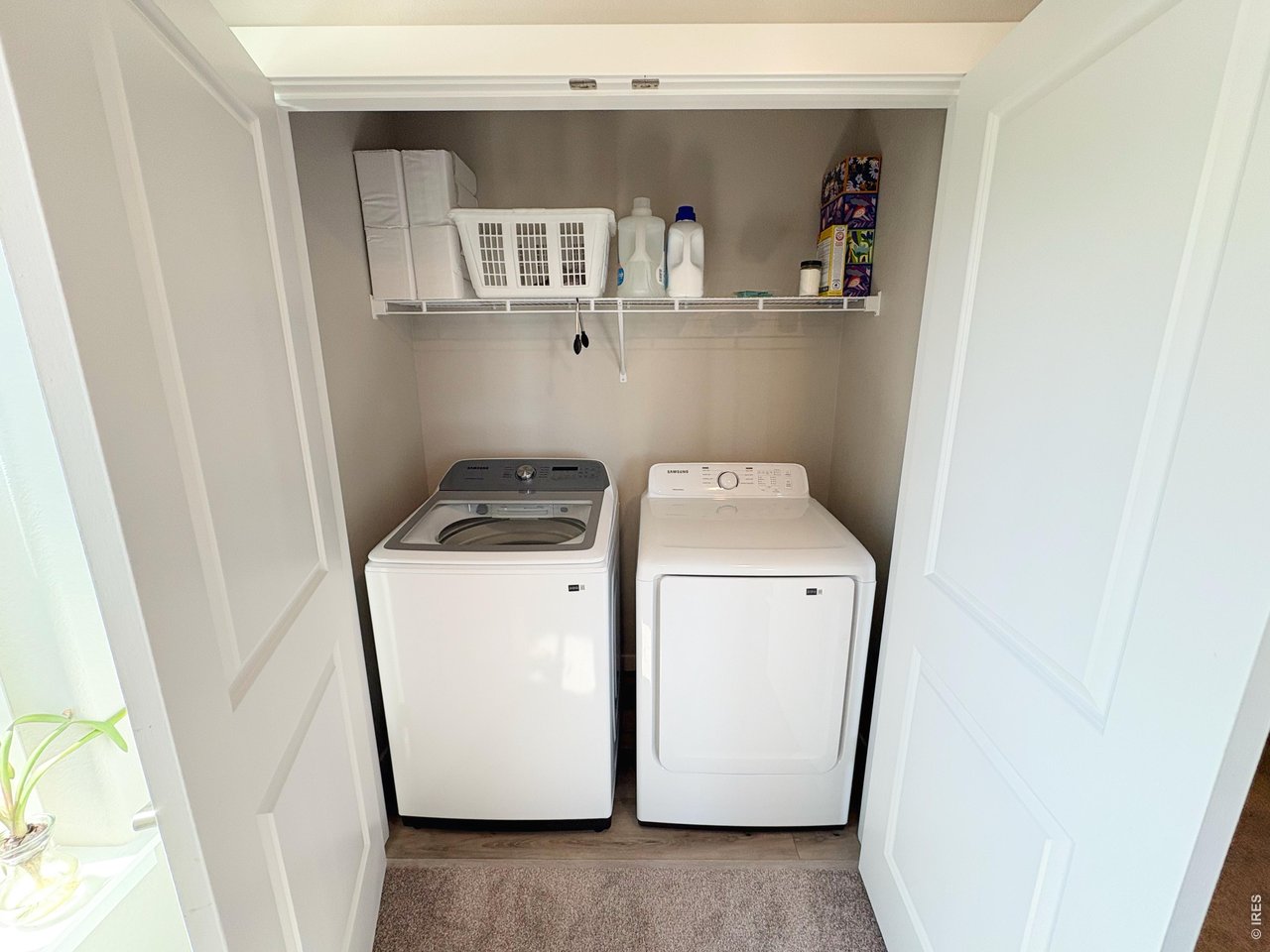 333 Pyramid Peak Street Berthoud, CO 80513 - Photo 13 of 21 a utility room with dryer and washer