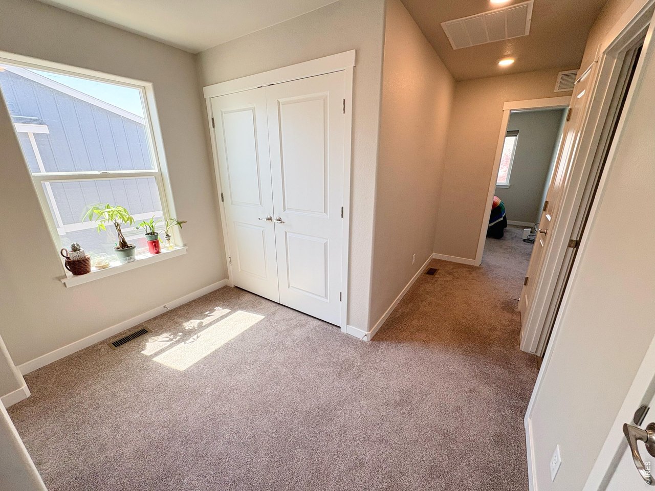 333 Pyramid Peak Street Berthoud, CO 80513 - Photo 16 of 21 a view of an empty room and a window