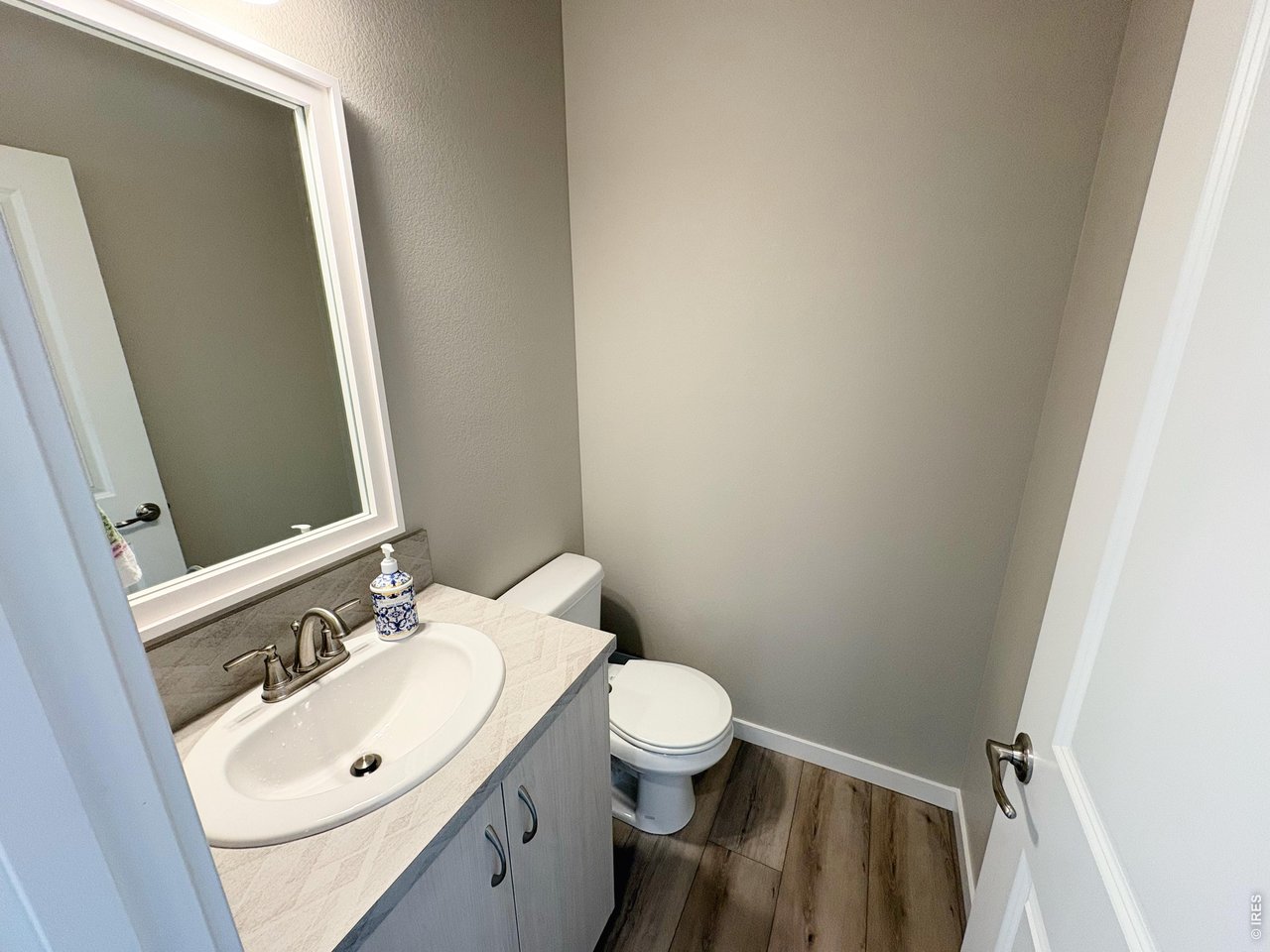 333 Pyramid Peak Street Berthoud, CO 80513 - Photo 8 of 21 a bathroom with a sink and a mirror