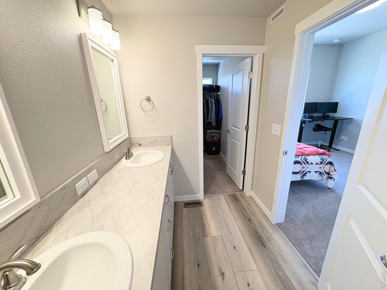 333 Pyramid Peak Street Berthoud, CO 80513 - Photo 10 of 21 a view of a bedroom from a hallway