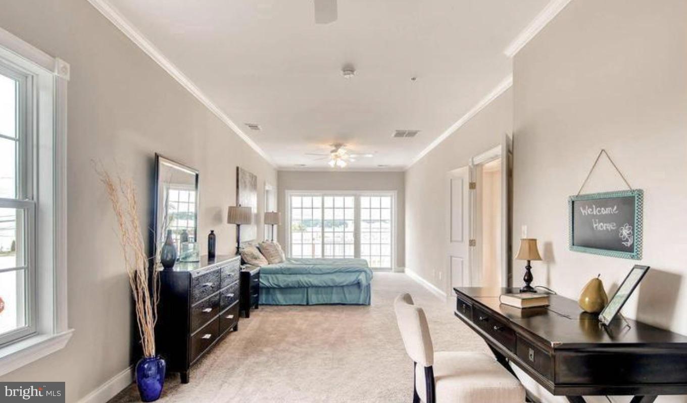 8319 Bletzer Road Baltimore, MD 21222 - Photo 5 of 7 a living room with furniture and a large window