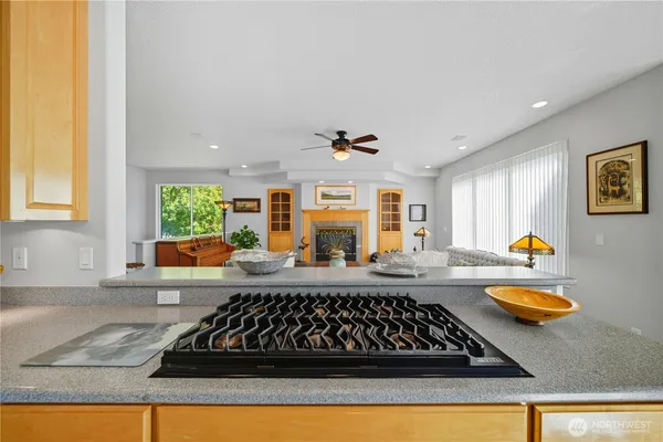 a kitchen with stainless steel appliances a sink and cabinets