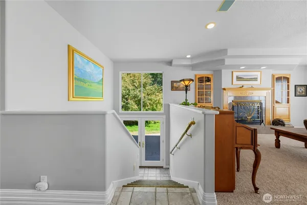 a kitchen with a table and chairs
