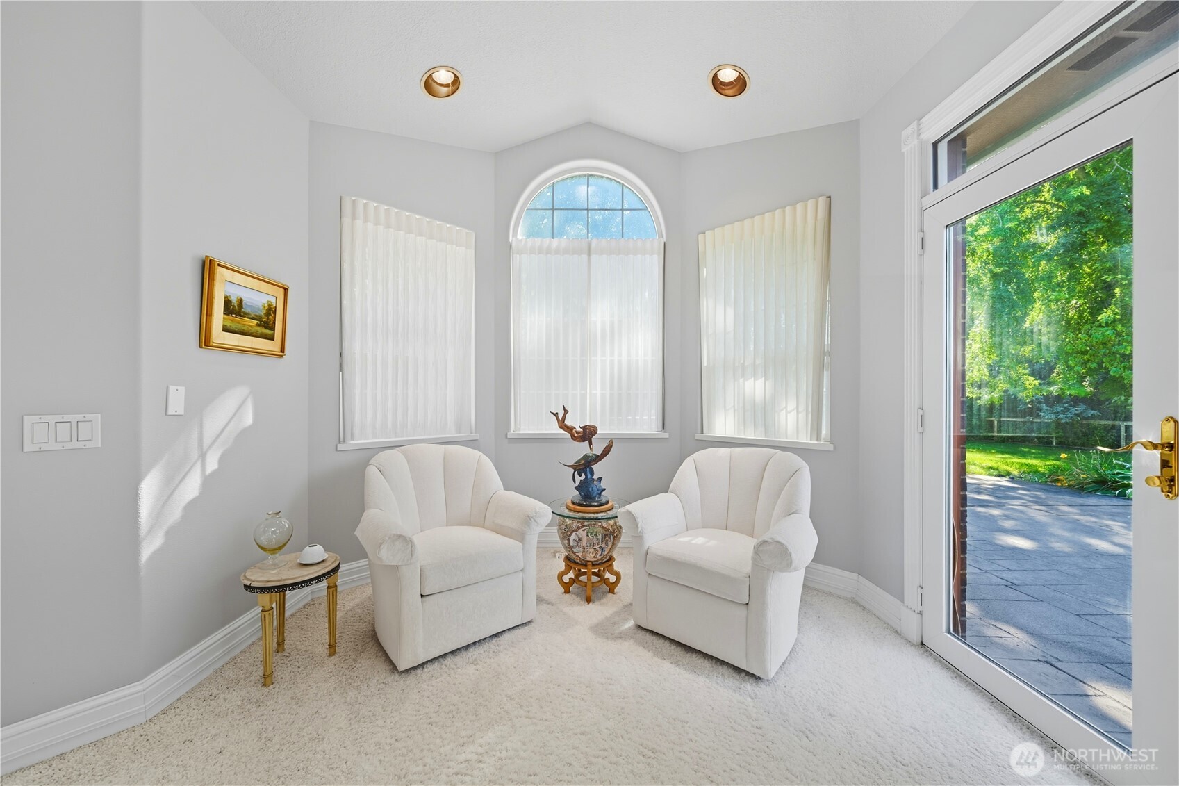 1629 Wheatcrest Road Walla Walla, WA 99362 - Photo 10 of 40 a living room with furniture and a floor to ceiling window