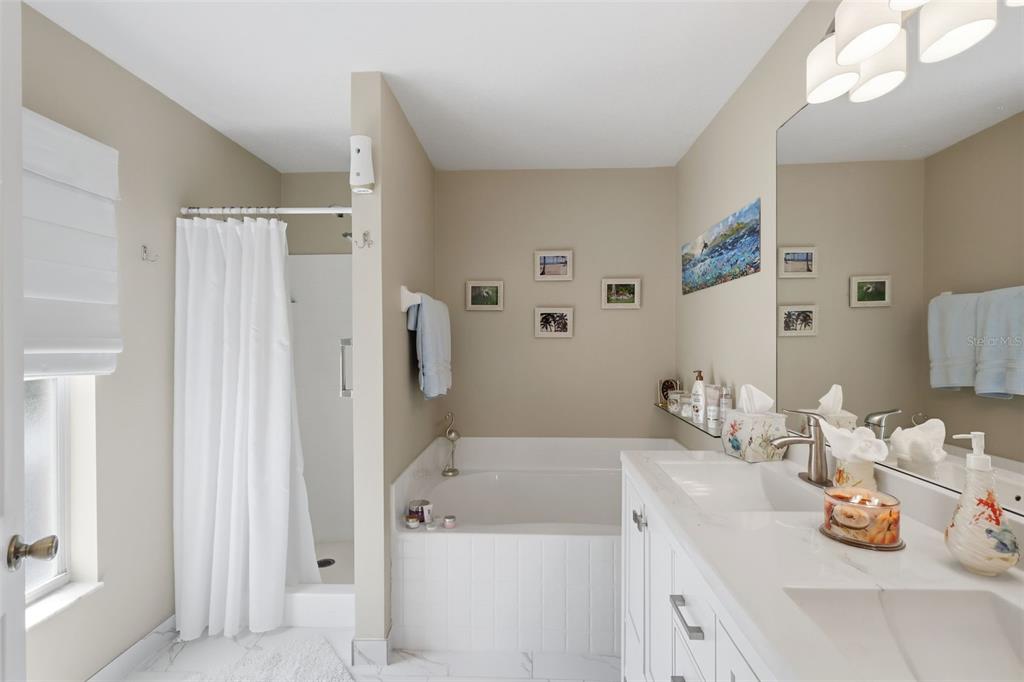 403 Central Mariners Drive Edgewater, FL 32141 - Photo 27 of 42 a bathroom with a sink toilet and shower