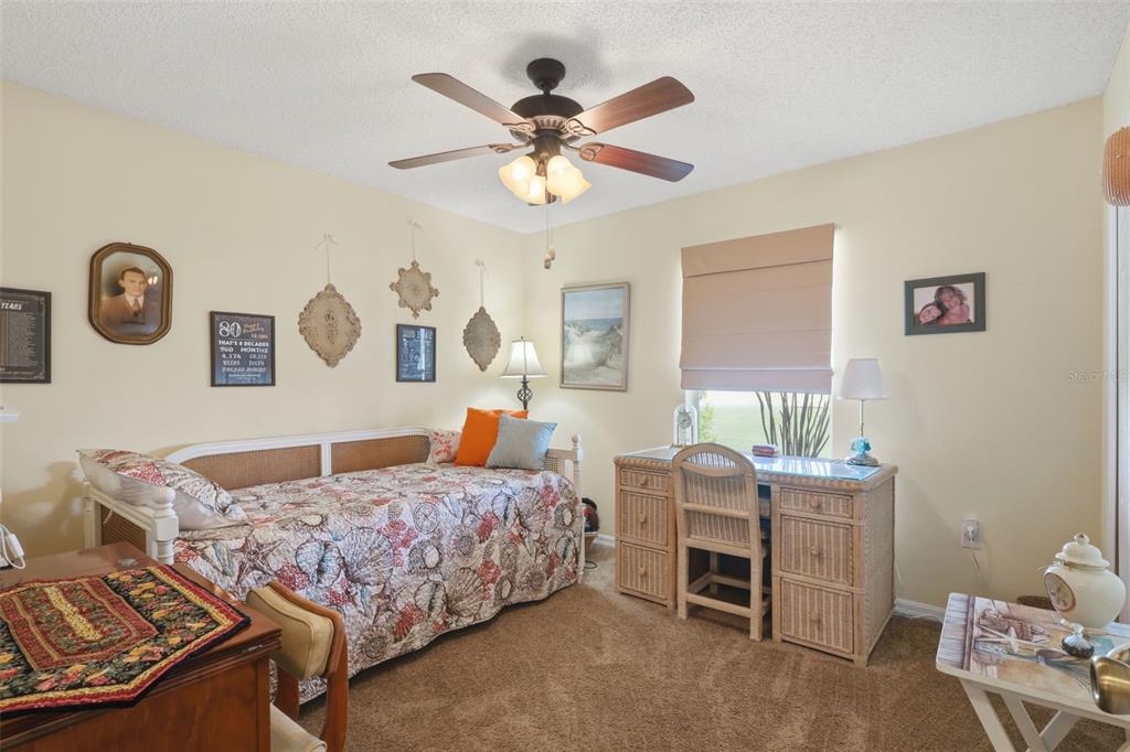 403 Central Mariners Drive Edgewater, FL 32141 - Photo 30 of 42 a bedroom with bed and a window