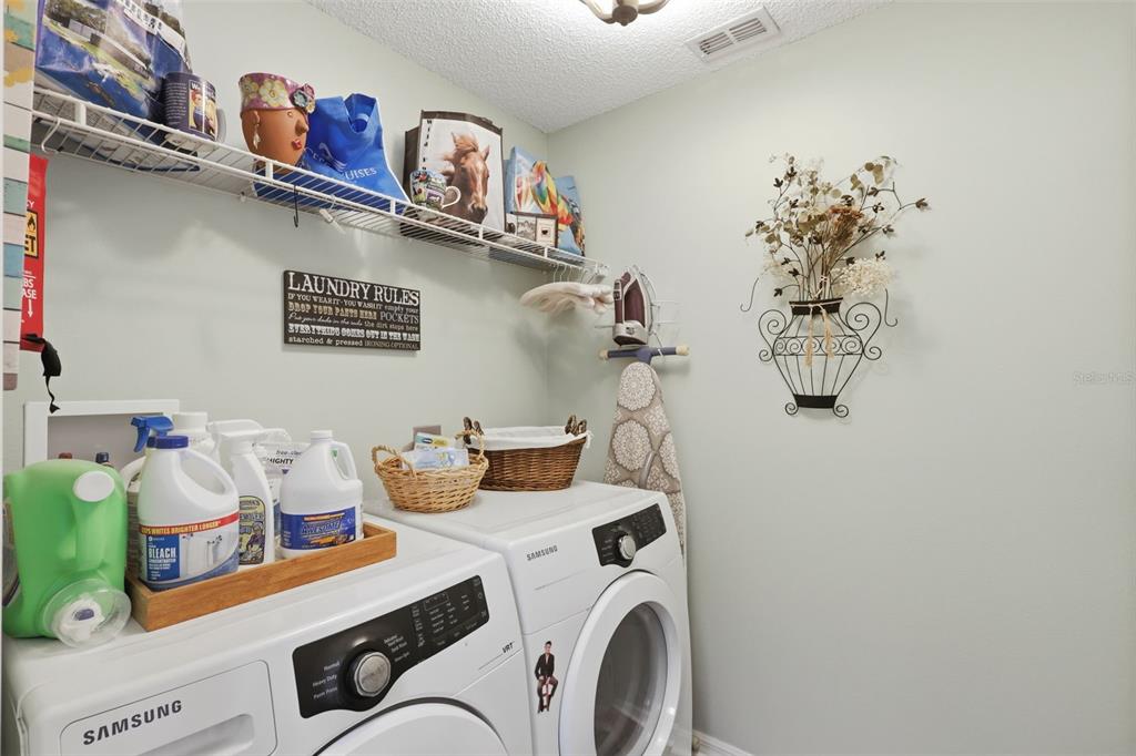 403 Central Mariners Drive Edgewater, FL 32141 - Photo 31 of 42 a view of storage and utility room