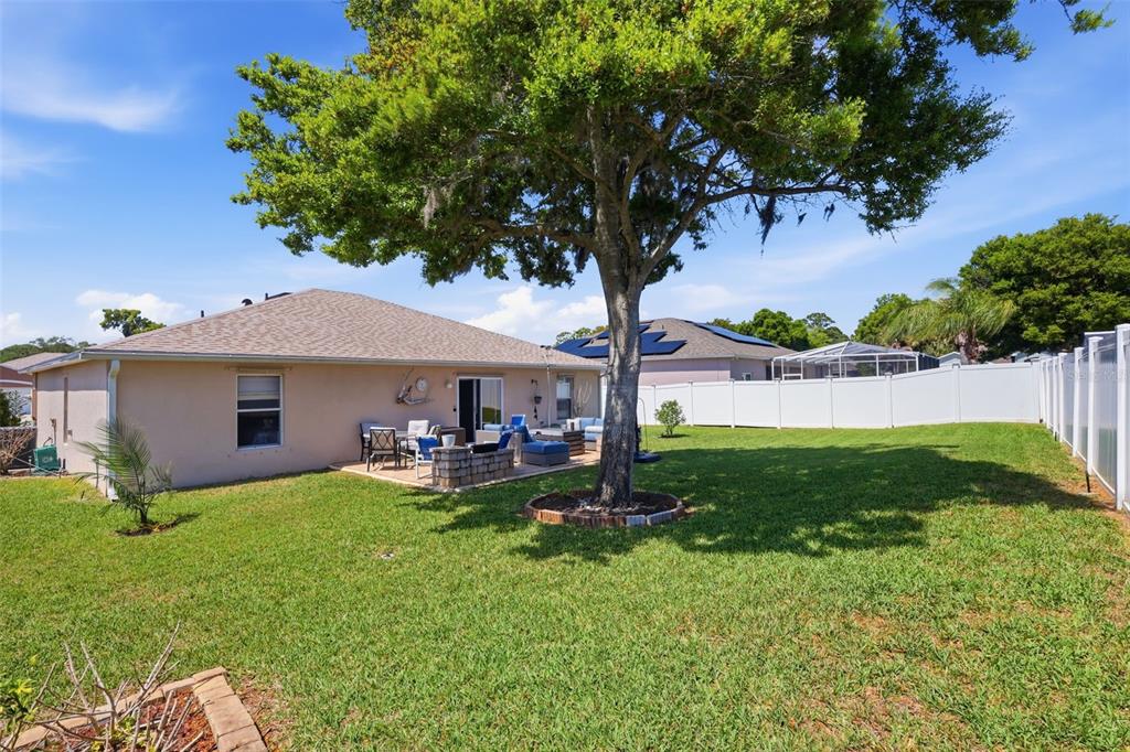 403 Central Mariners Drive Edgewater, FL 32141 - Photo 36 of 42 a front view of a house with garden