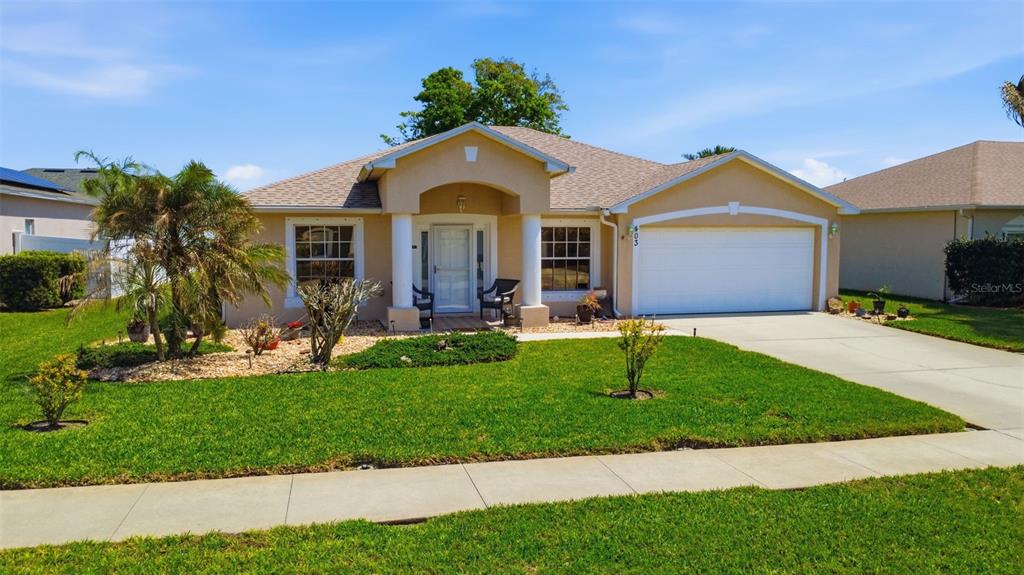 403 Central Mariners Drive Edgewater, FL 32141 - Photo 5 of 42 a front view of house with yard