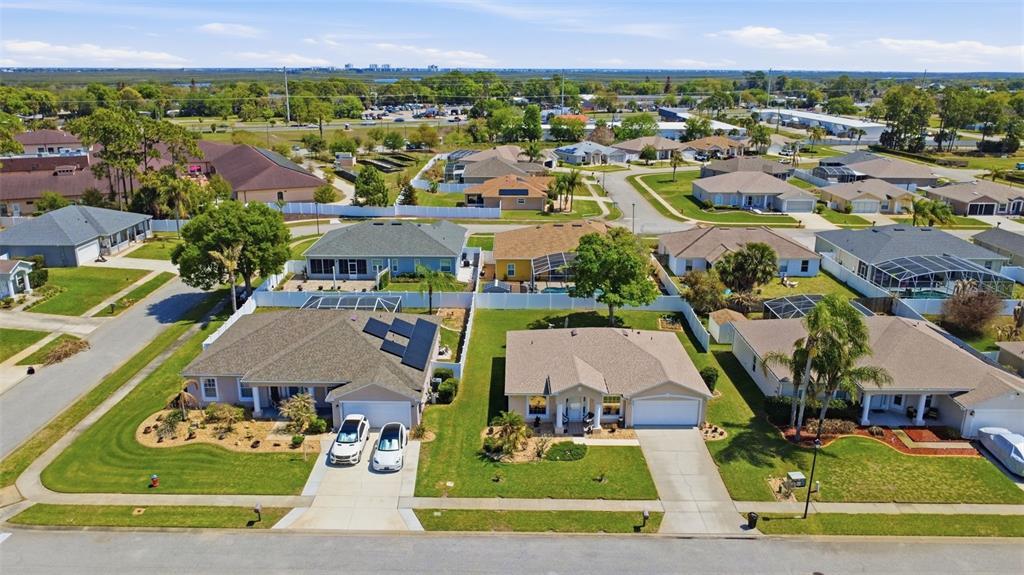 403 Central Mariners Drive Edgewater, FL 32141 - Photo 6 of 42 an aerial view of residential houses with outdoor space and parking