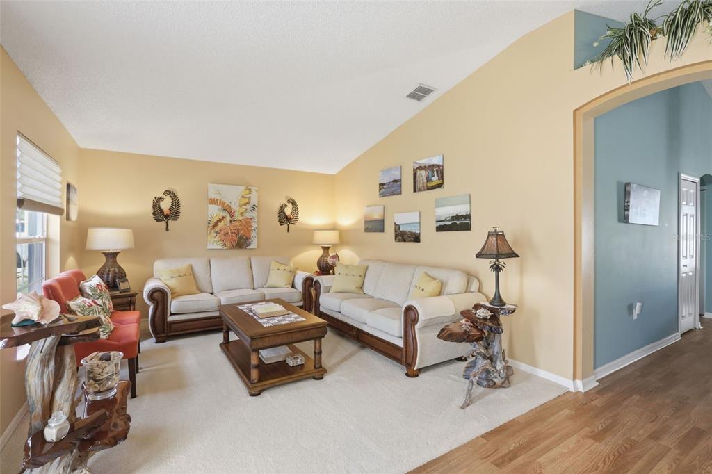 403 Central Mariners Drive Edgewater, FL 32141 - Photo 9 of 42 a bedroom with furniture and a wooden floor