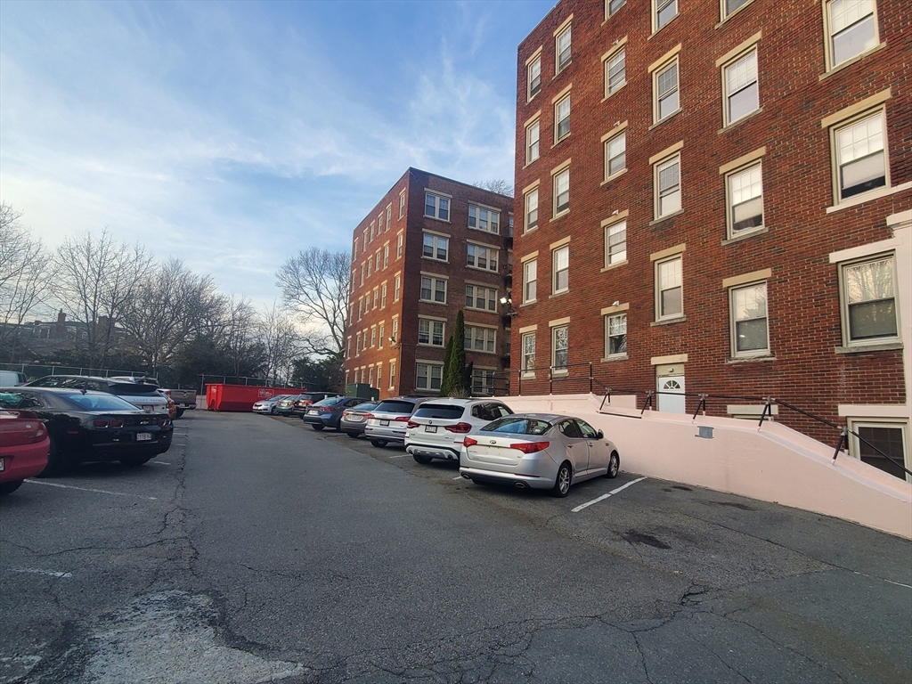 415 County Street, Unit 116 New Bedford, MA 02740 - Photo 12 of 14 a cars parked in front of a building