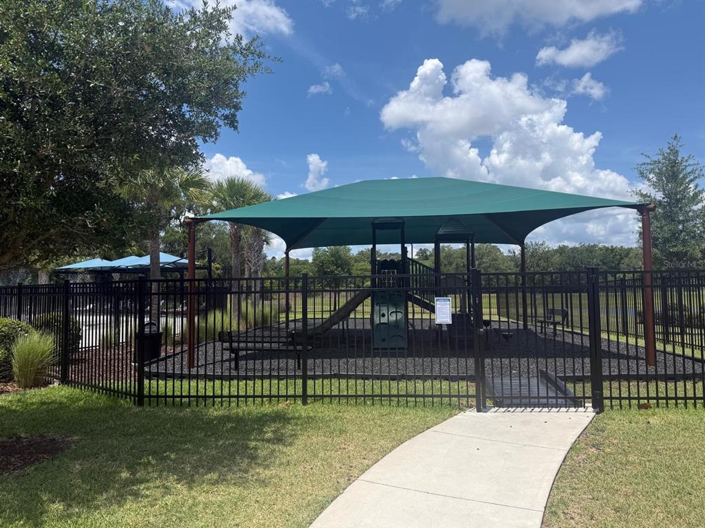754 Chinoy Road Davenport, FL 33837 - Photo 24 of 26 a view of a wrought iron fences in front of house