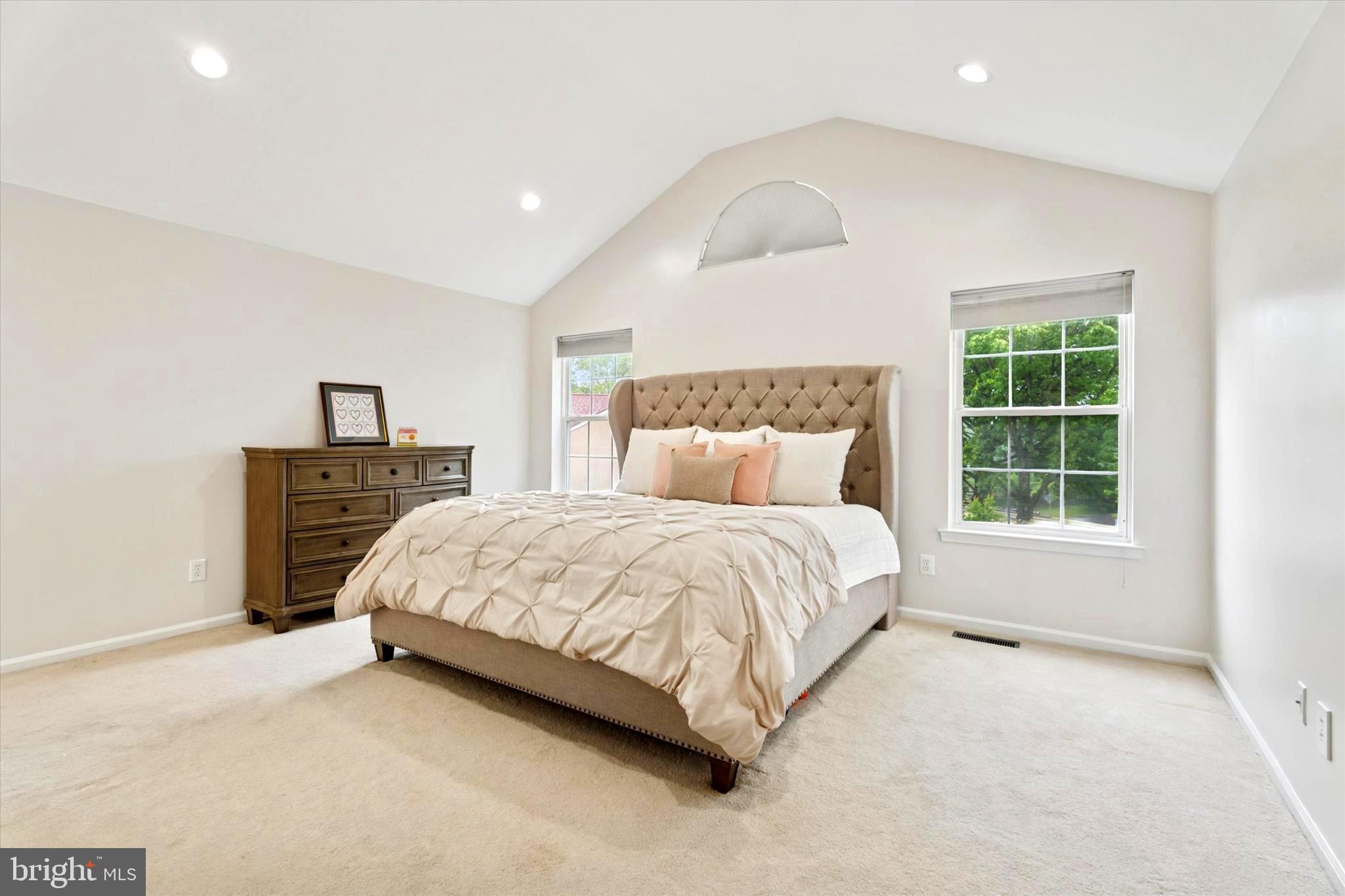 164 West Thompson Avenue Springfield, PA 19064 - Photo 11 of 28 a spacious bedroom with a bed and a large window
