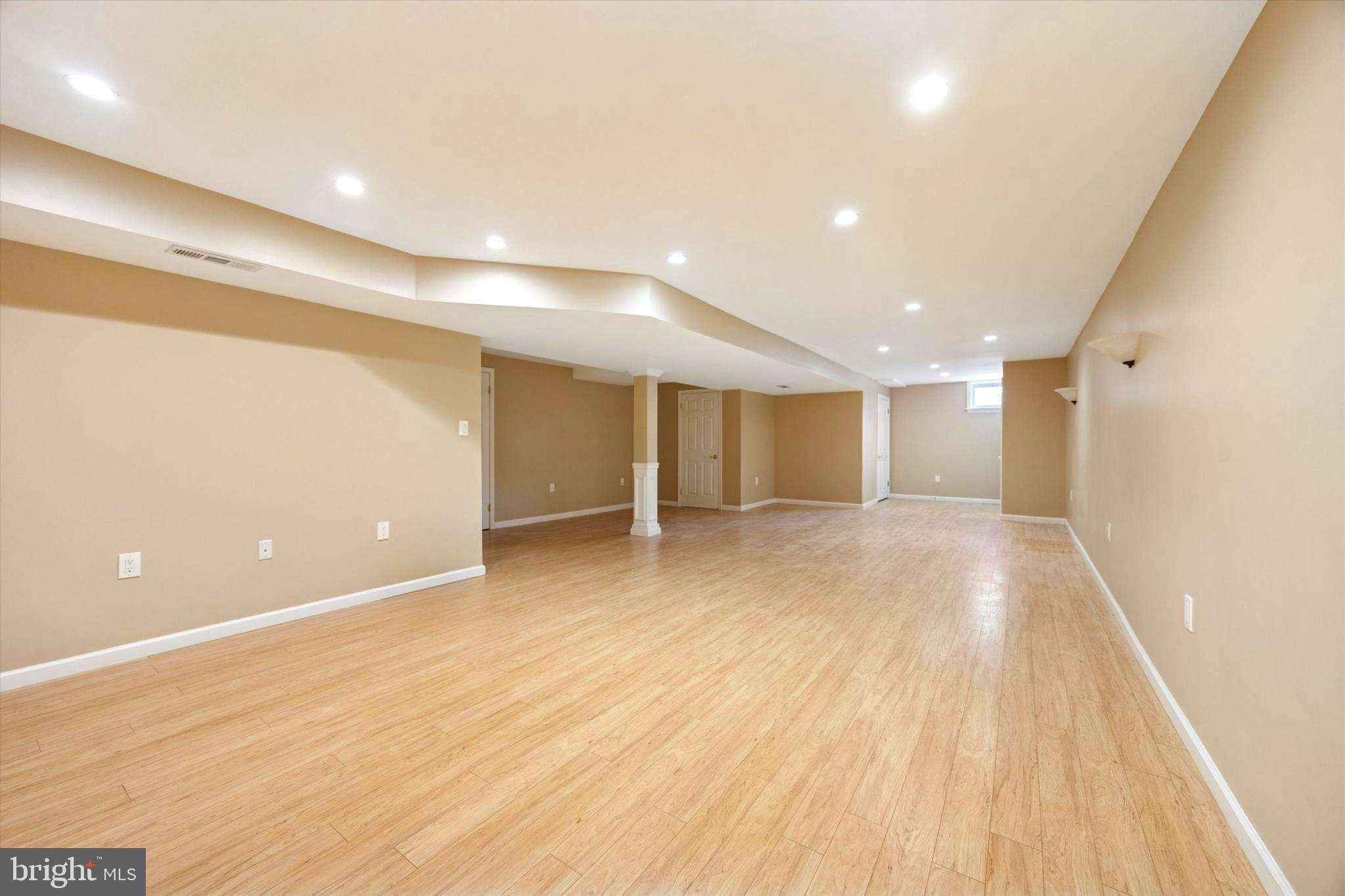 164 West Thompson Avenue Springfield, PA 19064 - Photo 21 of 28 a view of an empty room with wooden floor