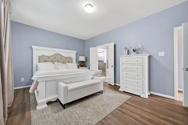 a bedroom with a bed and a closet