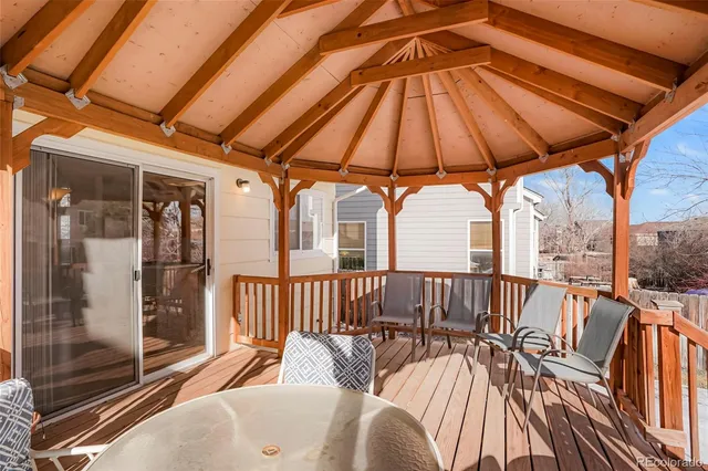 a view of a house with a snow in the yard