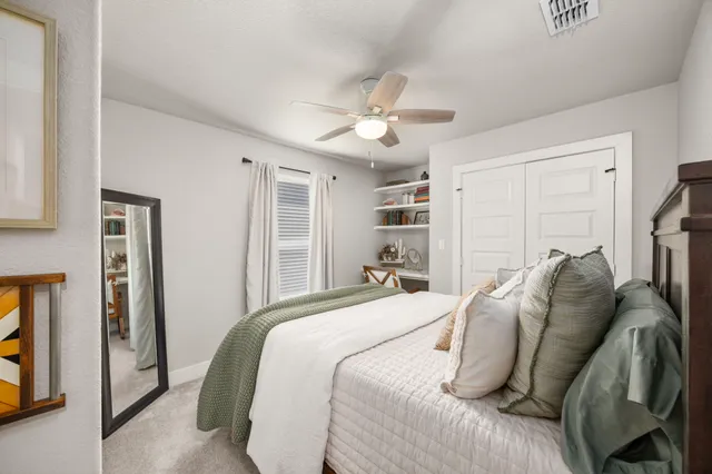 a outdoor space with patio furniture and potted plants