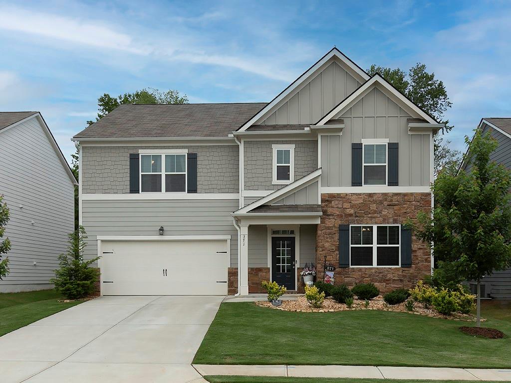 371 Highgrove Circle Dallas, GA 30157 - Photo 20 of 20 front view of a house with a yard