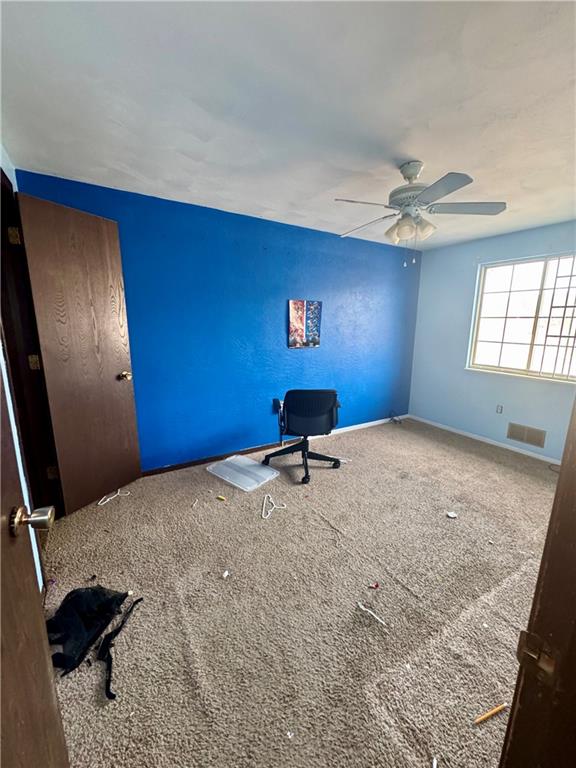 7305 Bennett Street Pittsburgh, PA 15208 - Photo 9 of 12 a bedroom with a bed and a window