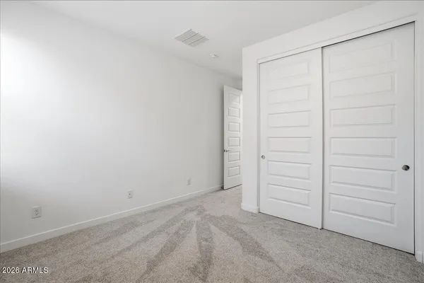 a front view of a house with a outdoor space