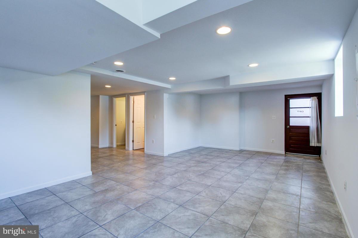 110 Wilgate Road Owings Mills, MD 21117 - Photo 27 of 30 Family Room Ceramic Tile Floor