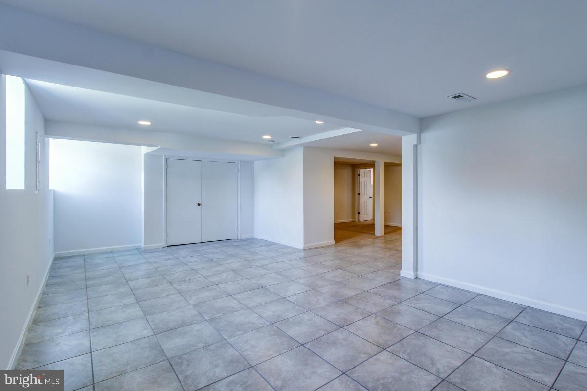 110 Wilgate Road Owings Mills, MD 21117 - Photo 28 of 30 Family Room Ceramic Tile Floor