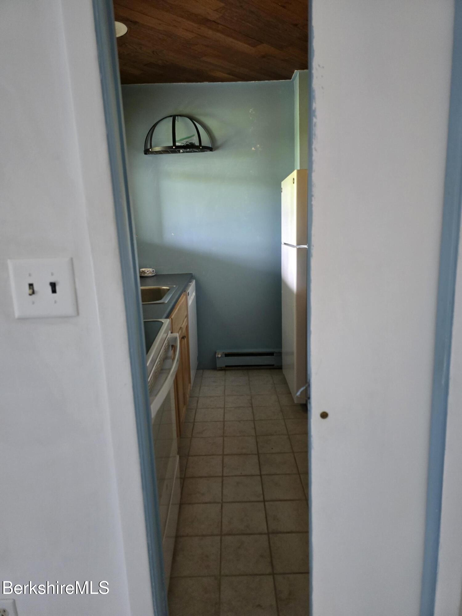 189 Stratton Road, Unit C4 Williamstown, MA 01267 - Photo 7 of 29 Kitchen has a pocket door!