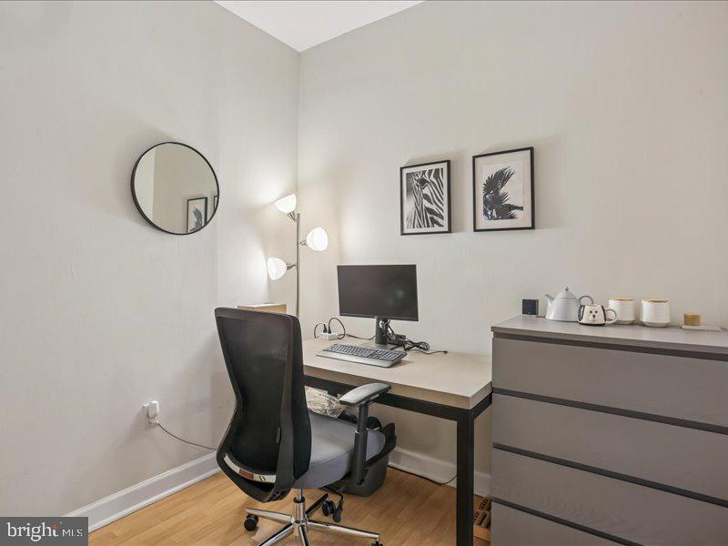 1615 Q Street Northwest, Unit 201 Washington, DC 20009 - Photo 14 of 20 a view of a workspace with furniture