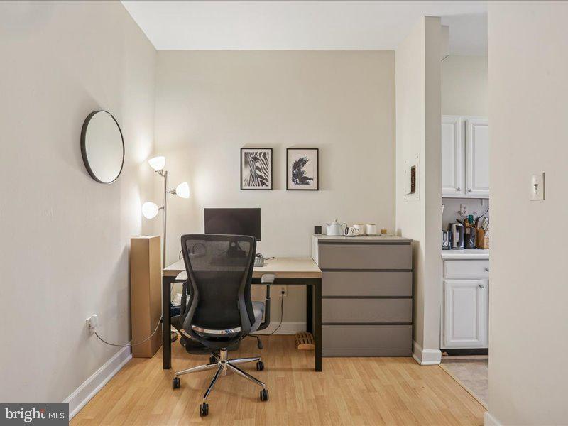 1615 Q Street Northwest, Unit 201 Washington, DC 20009 - Photo 15 of 20 a view of a workspace with furniture