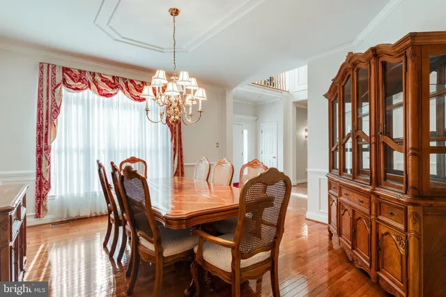 a view of a livingroom with furniture and wooden floor