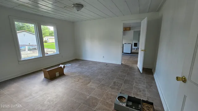 an empty room with windows