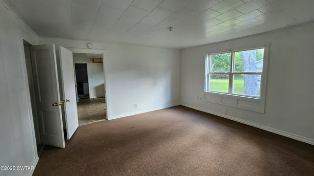 an empty room with a window
