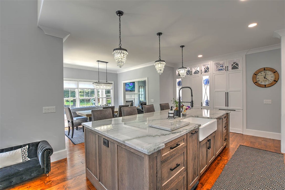 6323 Autumn Ridge Court Decatur, IL 62521 - Photo 13 of 43 a kitchen with a stove and a table